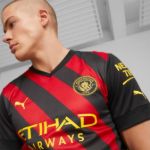 Image de MAILLOT MANCHESTER CITY EXTÉRIEUR 22/23  L Noir/rouge